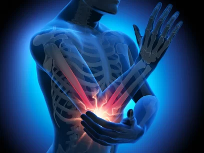 Human affected by pain caused by a tennis elbow injury